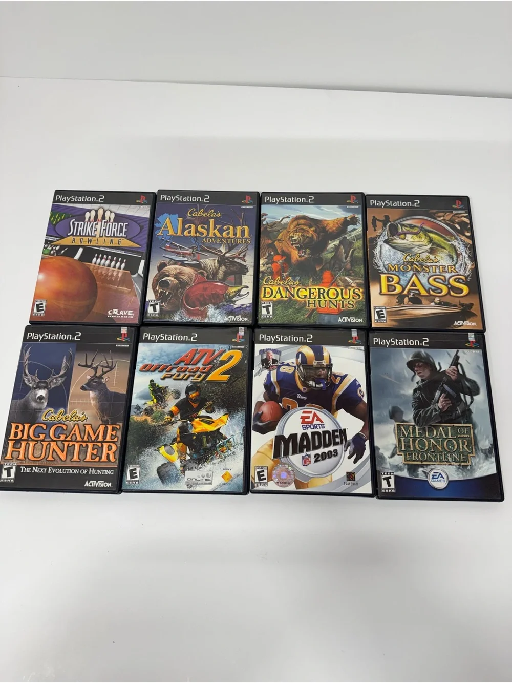 PlayStation2. (PS2) lot of 8 games with case and manual. Used good